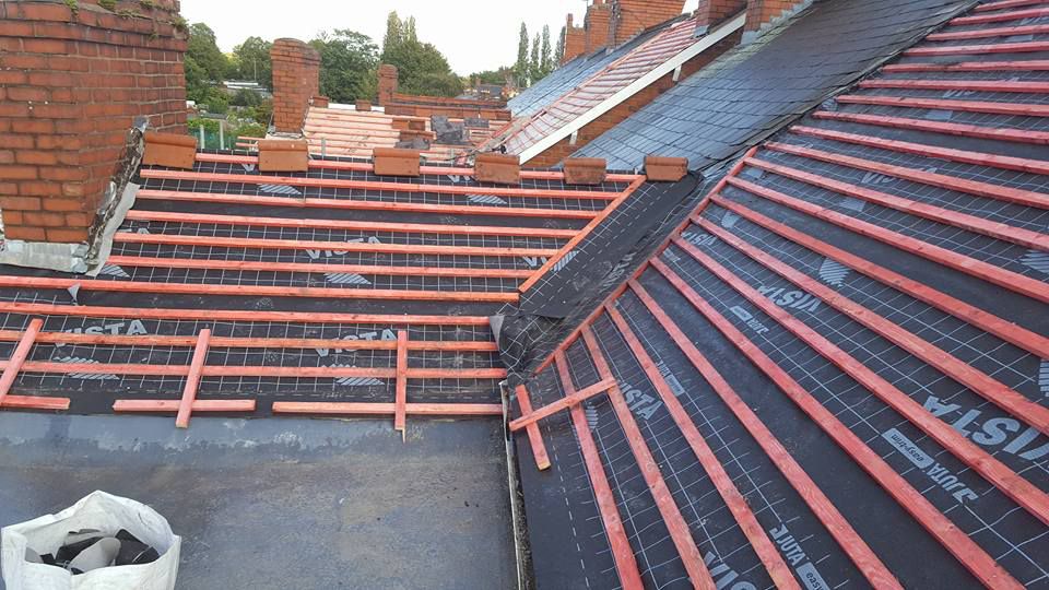 Re-roofing work being carried our by our staff