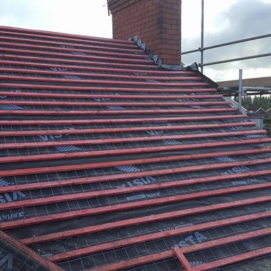 Progress of a re-roofing task being carried our by our staff