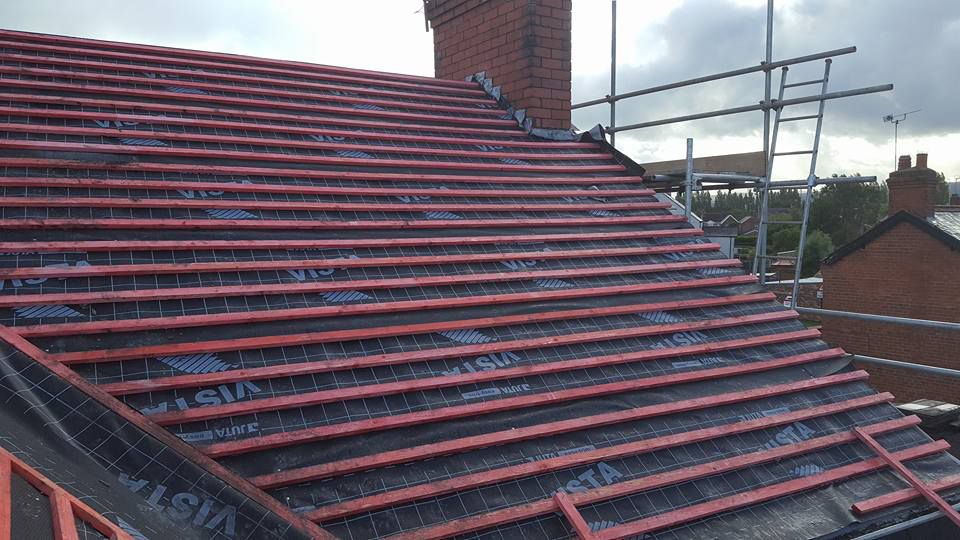 Progress of a re-roofing task being carried our by our staff