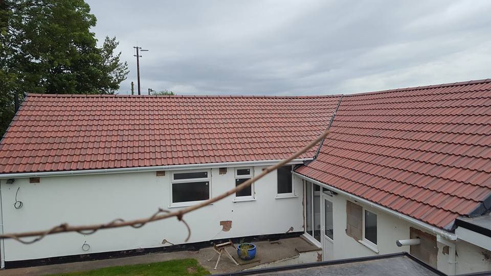 A new roof that has been installed by our team on a long home