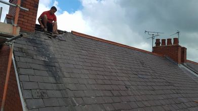 A newly started re-roofing job