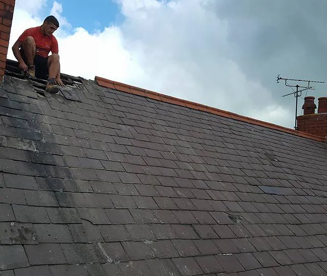 A newly started re-roofing job